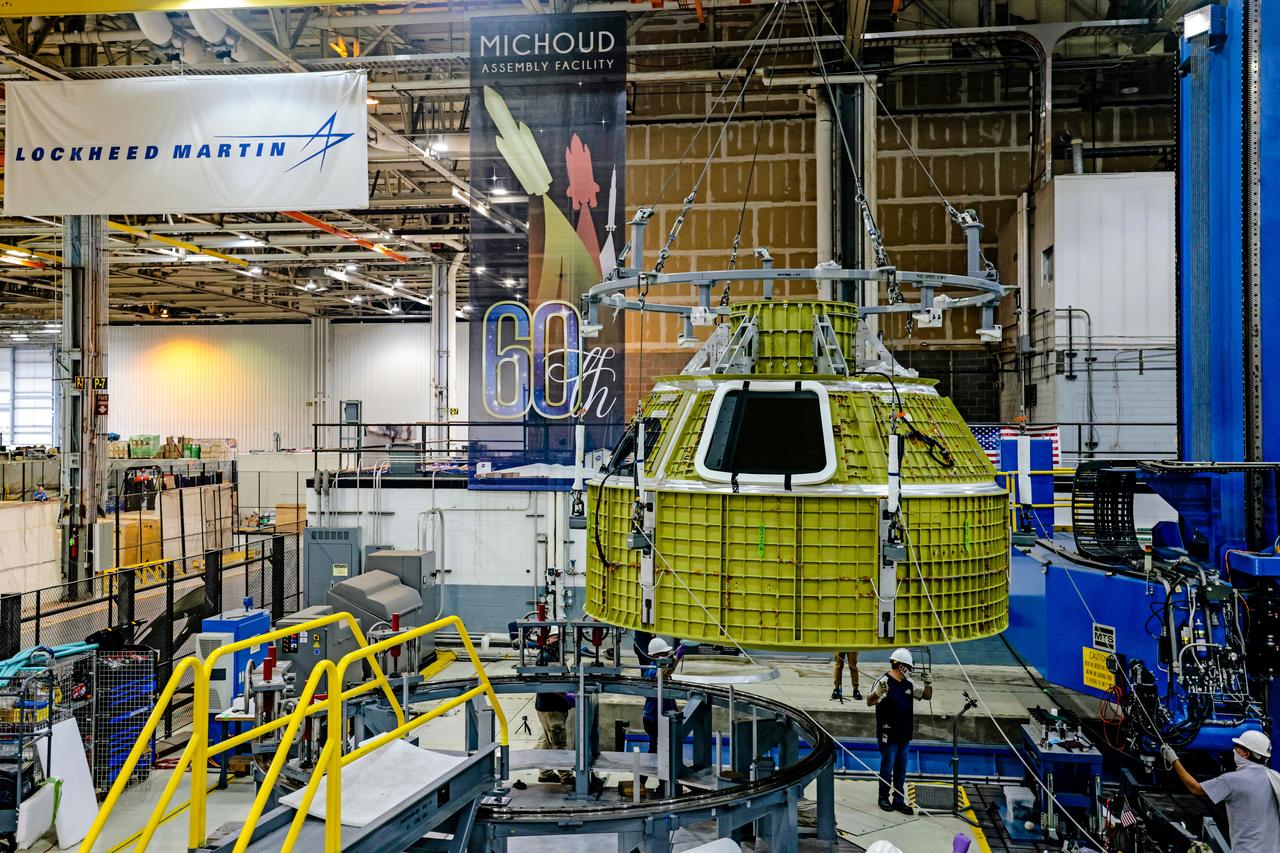At NASA's Michoud Assembly Facility in New Orleans, Orion's newly completed pressure vessel for the Artemis III mission is lifted out of the welding tool on Aug. 27, 2021. The pressure vessel is the primary structure for Orion's crew module, joined together using state-of-the-art welding by technicians from lead contractor Lockheed Martin.