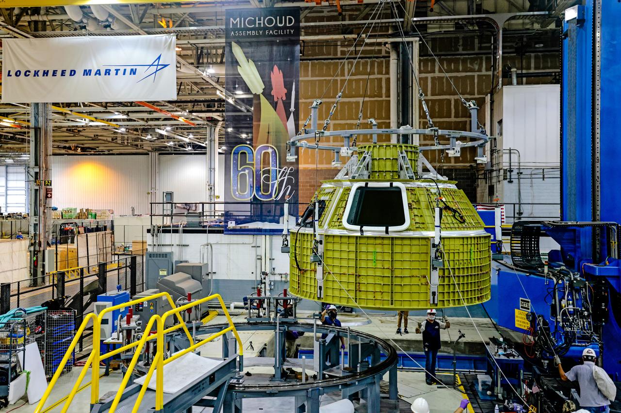 At NASA's Michoud Assembly Facility in New Orleans, Orion's newly completed pressure vessel for the Artemis III mission is lifted out of the welding tool on Aug. 27, 2021. The pressure vessel is the primary structure for Orion's crew module, joined together using state-of-the-art welding by technicians from lead contractor Lockheed Martin.