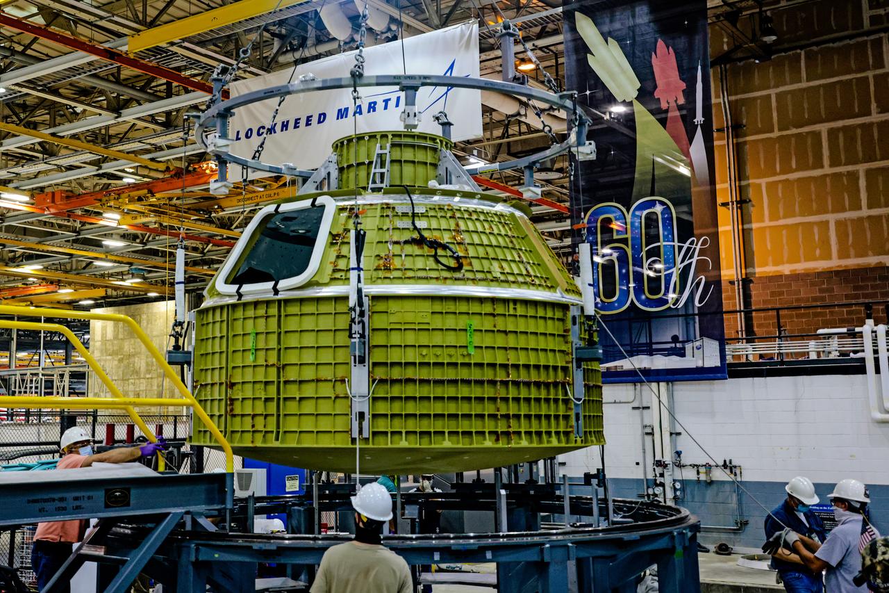 At NASA's Michoud Assembly Facility in New Orleans, Orion's newly completed pressure vessel for the Artemis III mission is lifted out of the welding tool on Aug. 27, 2021. The pressure vessel is the primary structure for Orion's crew module, joined together using state-of-the-art welding by technicians from lead contractor Lockheed Martin.