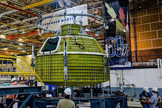 NASA image: Orion crew module pressure vessel lifted from welding tool