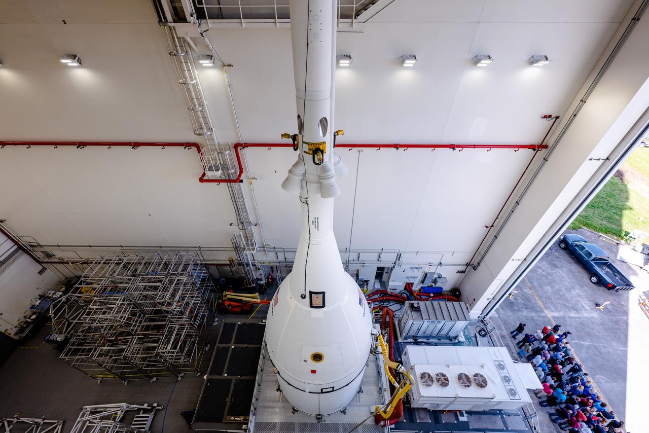 The team at Kennedy Space Center prepares the Artemis I Orion for transport from the Launch Abort System Facility to the Vehicle Assembly Building where it will be stacked atop the Launch Abort System.