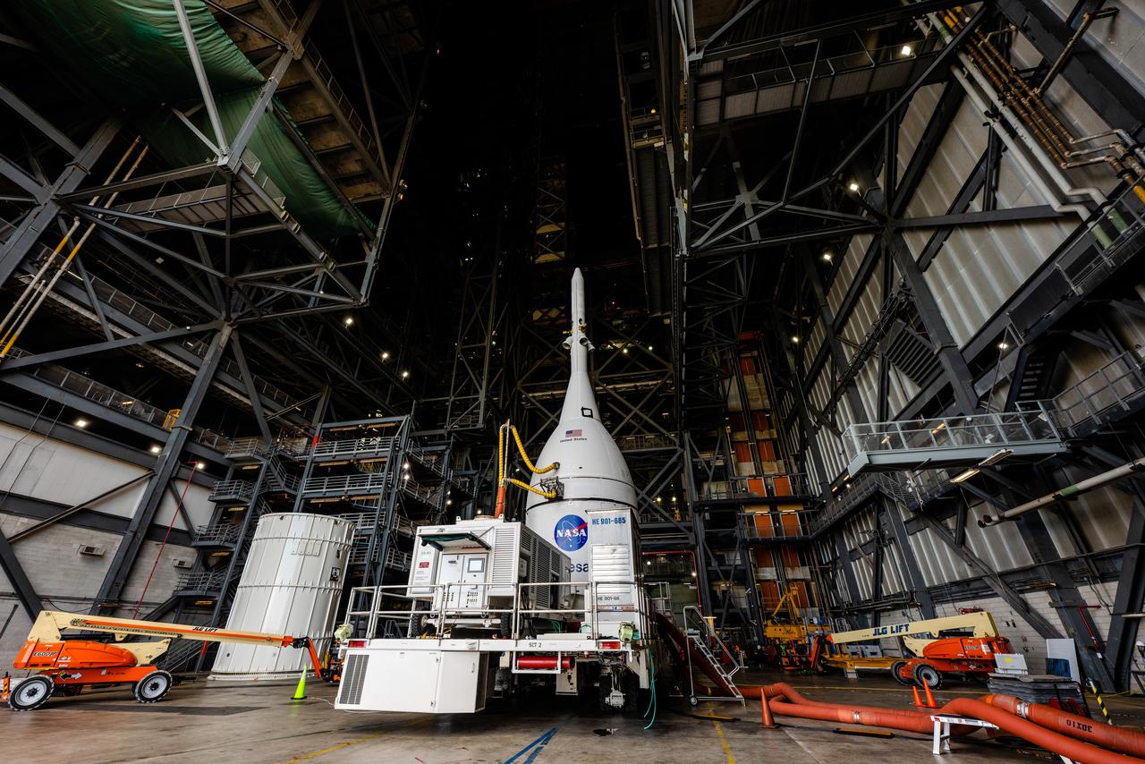 At Kennedy Space Center, the Artemis I Orion is transported from the Launch Abort System Facility to the Vehicle Assembly Building on Oct. 19, 2021, ahead of stacking on the Space Launch System rocket.
