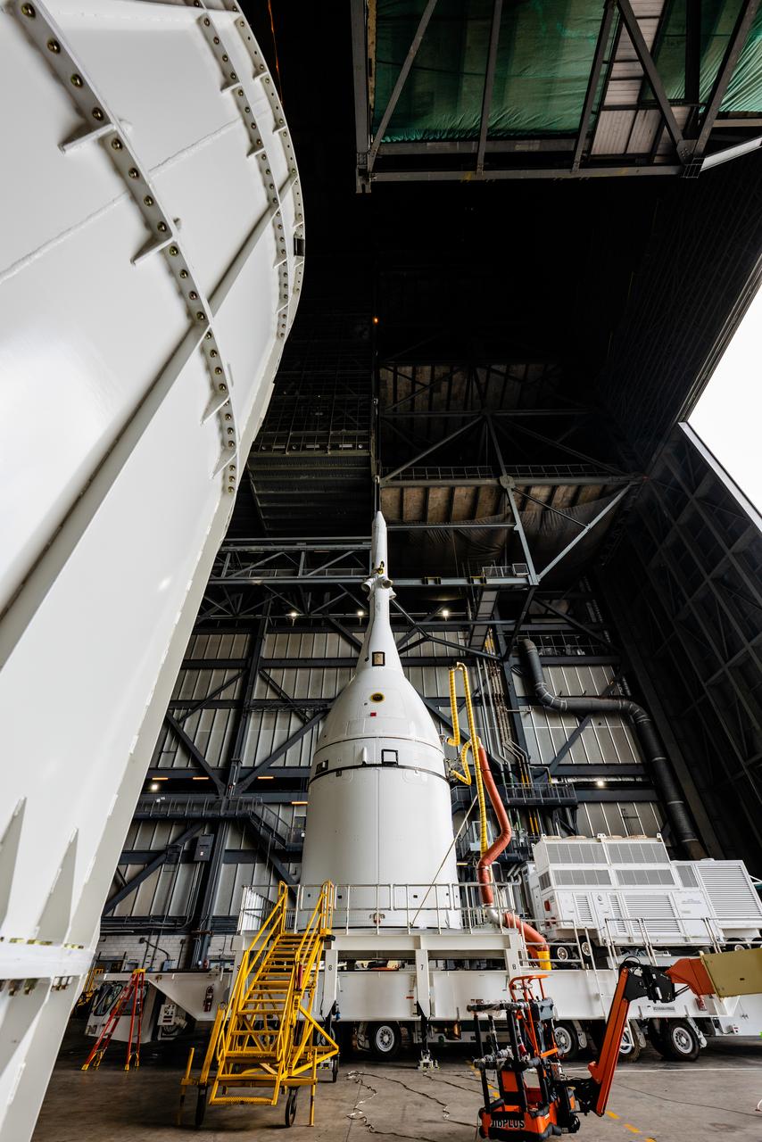 At Kennedy Space Center, the Artemis I Orion is transported from the Launch Abort System Facility to the Vehicle Assembly Building on Oct. 19, 2021, ahead of stacking on the Space Launch System rocket.