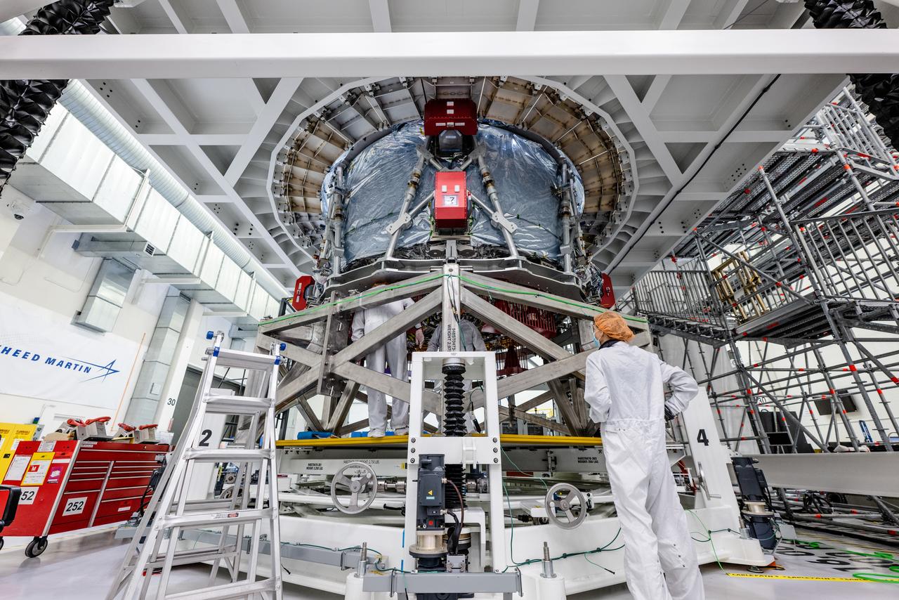 The crew module adapter, which connects Orion's crew module with the European Service module is lifted in preparation for mate with the Artemis II service module on Oct. 19, 2021, which recently arrived from Airbus in Bremen.