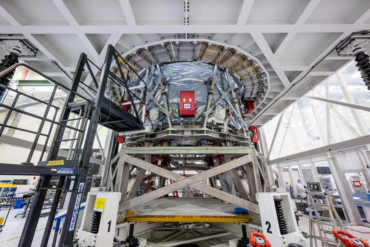 The crew module adapter, which connects Orion's crew module with the European Service module is lifted in preparation for mate with the Artemis II service module on Oct. 19, 2021, which recently arrived from Airbus in Bremen.
