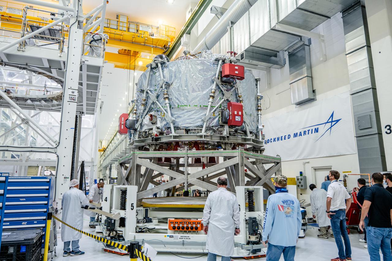 The crew module adapter, which connects Orion's crew module with the European Service module is lifted in preparation for mate with the Artemis II service module on Oct. 19, 2021, which recently arrived from Airbus in Bremen.