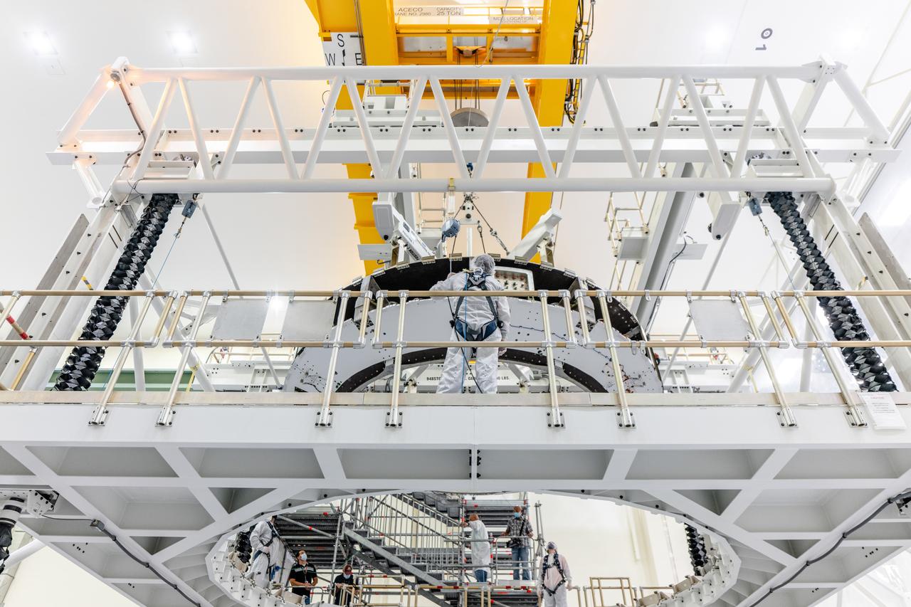 The crew module adapter, which connects Orion's crew module with the European Service module is lifted in preparation for mate with the Artemis II service module on Oct. 19, 2021, which recently arrived from Airbus in Bremen.