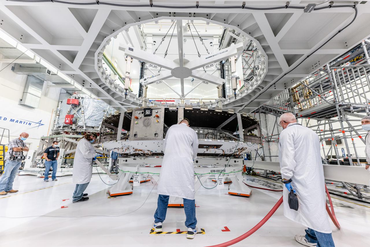 The crew module adapter, which connects Orion's crew module with the European Service module is lifted in preparation for mate with the Artemis II service module on Oct. 19, 2021, which recently arrived from Airbus in Bremen.