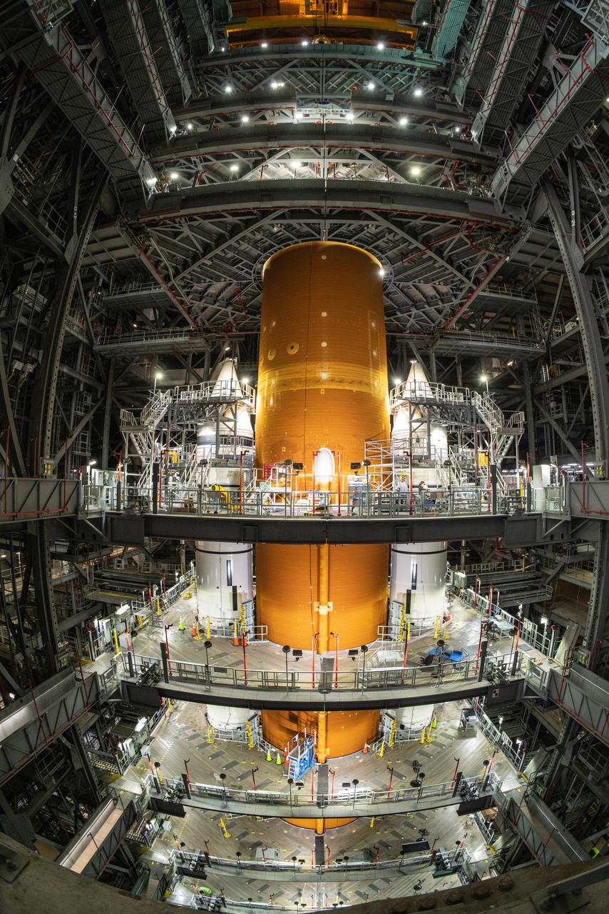The Orion spacecraft for NASA’s Artemis I mission, fully assembled with its launch abort system, is stacked on the Space Launch System (SLS) rocket in High Bay 3 of the Vehicle Assembly Building at Kennedy Space Center in Florida on Oct. 20, 2021. The stacking of Orion on top of the SLS completes assembly for the Artemis I flight test. Teams will begin conducting a series of verification tests ahead of rolling out to Launch Complex 39B for the Wet Dress Rehearsal.