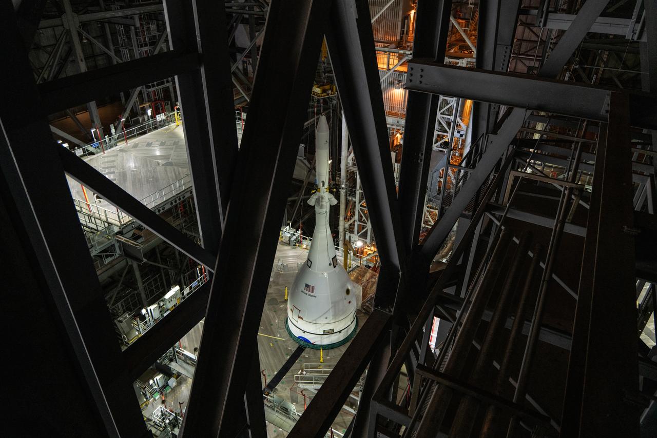 The Orion spacecraft for NASA’s Artemis I mission, fully assembled with its launch abort system, is stacked on the Space Launch System (SLS) rocket in High Bay 3 of the Vehicle Assembly Building at Kennedy Space Center in Florida on Oct. 20, 2021. The stacking of Orion on top of the SLS completes assembly for the Artemis I flight test. Teams will begin conducting a series of verification tests ahead of rolling out to Launch Complex 39B for the Wet Dress Rehearsal.
