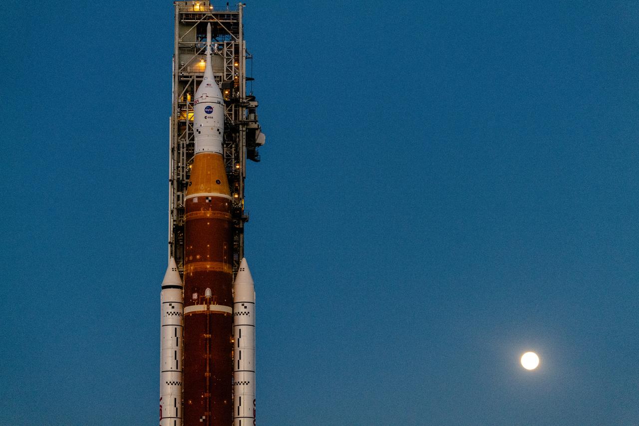 The Artemis I vehicle, with the Orion spacecraft atop, rolls for wet dress rehearsal from the Vehicle Assembly Building at NASA’s Kennedy Space Center on March 17, 2022. At the pad, the vehicle will undergo checkouts and teams will practice countdown to ensure the stack is ready for launch.
