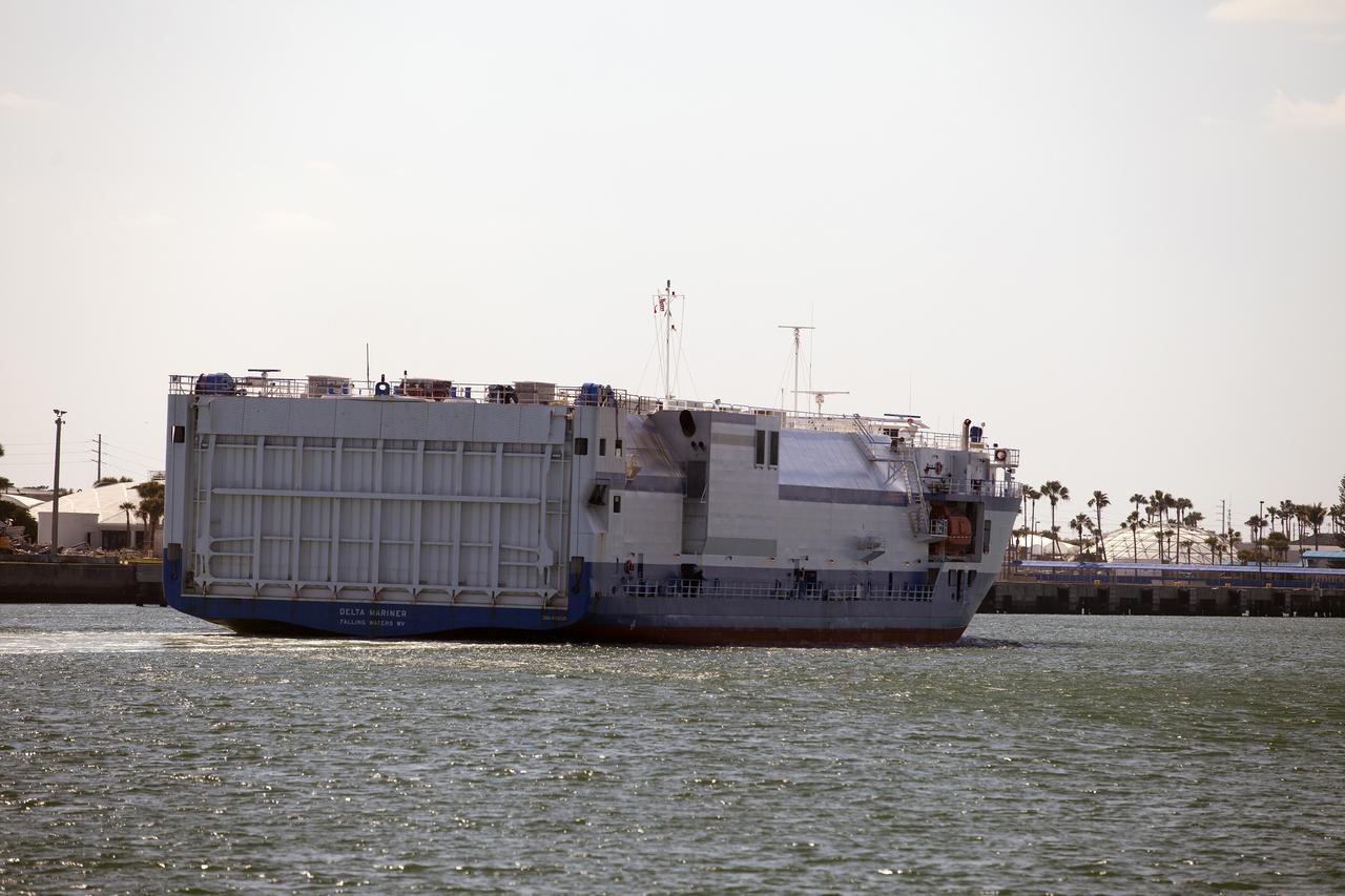 The United Launch Alliance barge Delta Mariner nears the dock in Port Canaveral in Florida on March 6, 2014. The barge is carrying two of the booster stages for the Delta IV Heavy rocket slated for Orion's Exploration Flight Test-1, or EFT-1. Orion is the exploration spacecraft designed to carry astronauts to destinations not yet explored by humans. It will have emergency abort capability, sustain the crew during space travel and provide safe re-entry from deep-space return velocities.