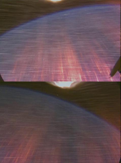 A view from the side windows as plasma surrounds the vehicle during reentry on Orion's first flight test, Exploration Flight Test-1 (EFT-1), on December 5, 2014.