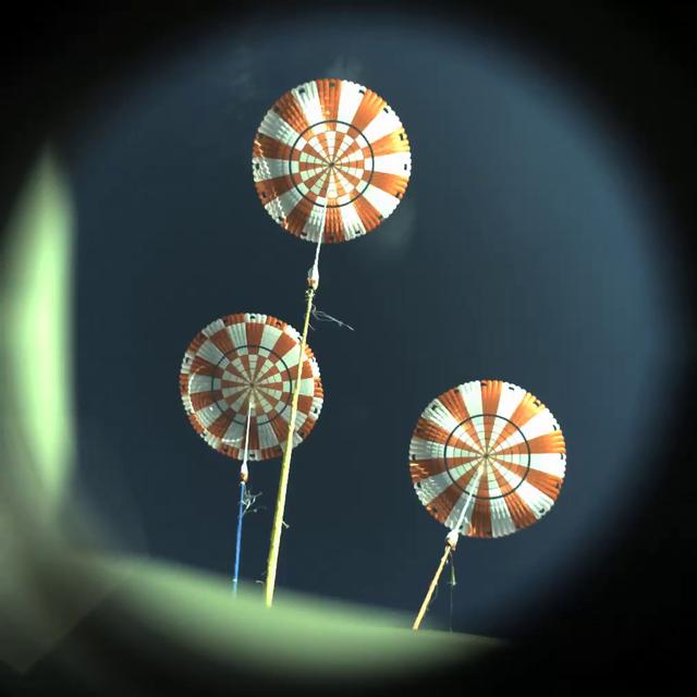 The main parachutes deploy on Orion's first flight test, Exploration Flight Test-1 (EFT-1), on December 5, 2014.