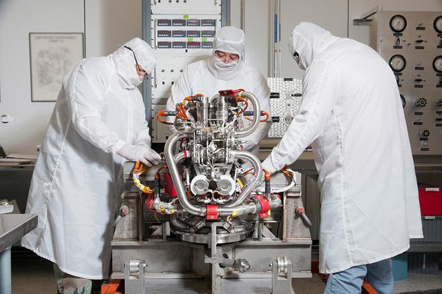 Engineers and technicians in NASA White Sands Test Facility’s Technical Services Section conduct functional tests on Orbital Maneuvering System Engine 108 for Orion on May 1, 2018.