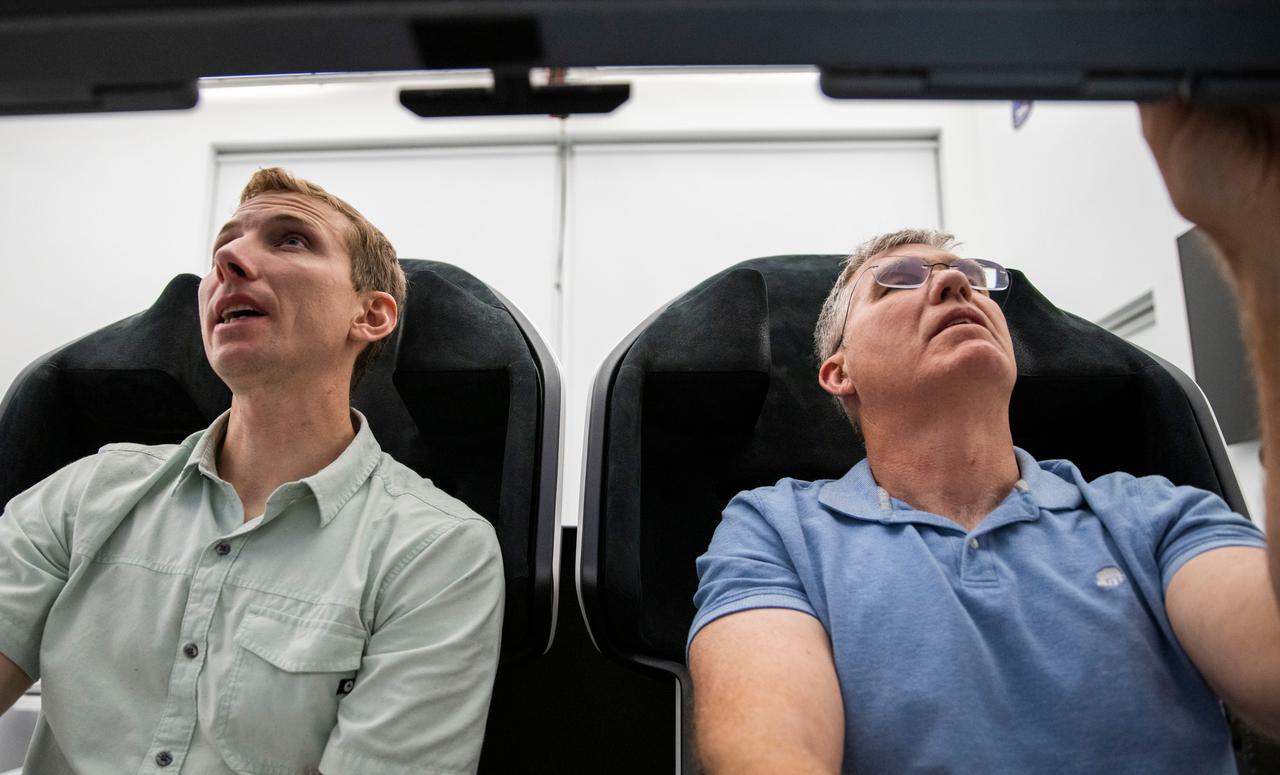 jsc2022e065070 (March 24, 2022) --- (From left) SpaceX Crew-6 Pilot Warren "Woody" Hoburg and Commander Stephen Bowen, both from NASA, are pictured during a cockpit training session at the company's headquarters in Hawthorne, California. Credit: SpaceX