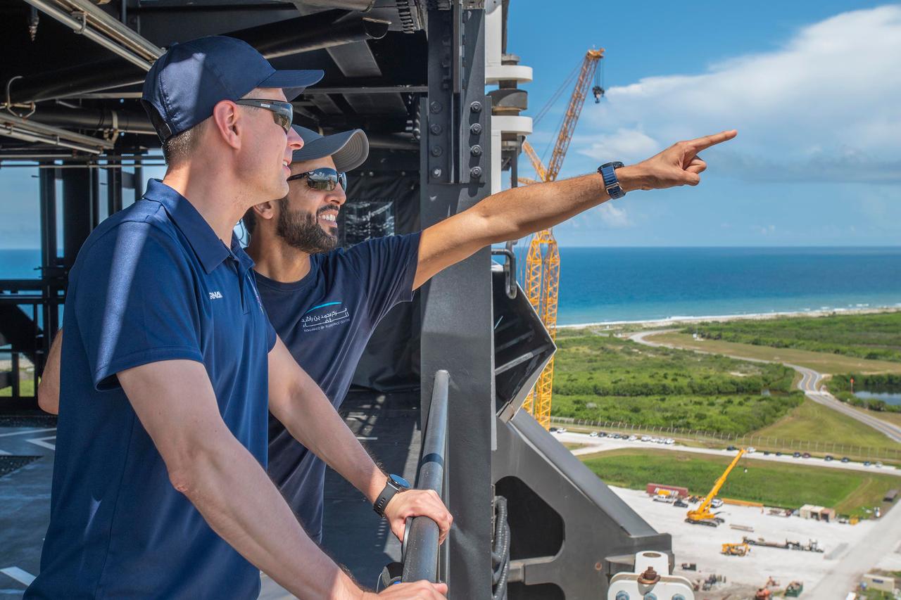 jsc2022e065086 (Aug. 8, 2022) --- Two crew members of the SpaceX Crew-6 mission are pictured during a training session at the Kennedy Space Center's Launch Pad 39A in Florida. From front to back are, Mission Specialists Andrey Fedyaev and Sultan Alneyadi. Credit: SpaceX