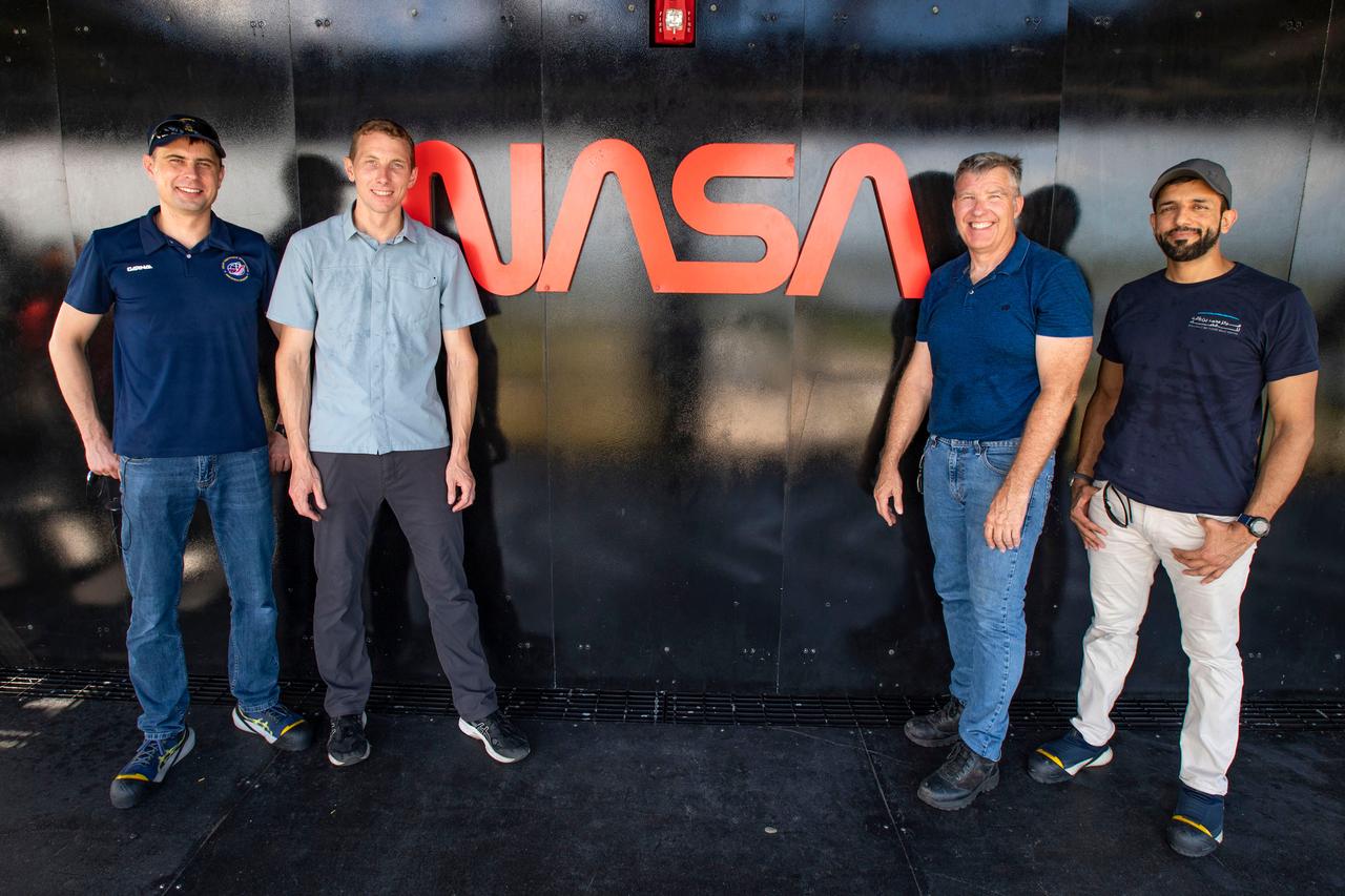 jsc2022e065087 (Aug. 8, 2022) --- The four crew members that comprise the SpaceX Crew-6 mission pose for a photo during a training session at the Kennedy Space Center's Launch Pad 39A in Florida. From left are, Mission Specialist Andrey Fedyaev, Pilot Warren "Woody" Hoburg, Mission Specialist Sultan Alneyadi, and Commander Stephen Bowen. Credit: SpaceX