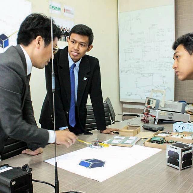 jsc2022e068262 (5/1/2022) --- A view of the SS-1 Team during the JAXA Safety Review. The Surya Satellite-1 (SS-1) is the first Indonesian nanosatellite developed by university students at Surya University. SS-1 tests a satellite telecommunication system to serve amateur radio stations, and serves as a proof of concept of sensoric information transfer in rural areas for disaster mitigation application. Image Courtesy of The SS-1 Team.