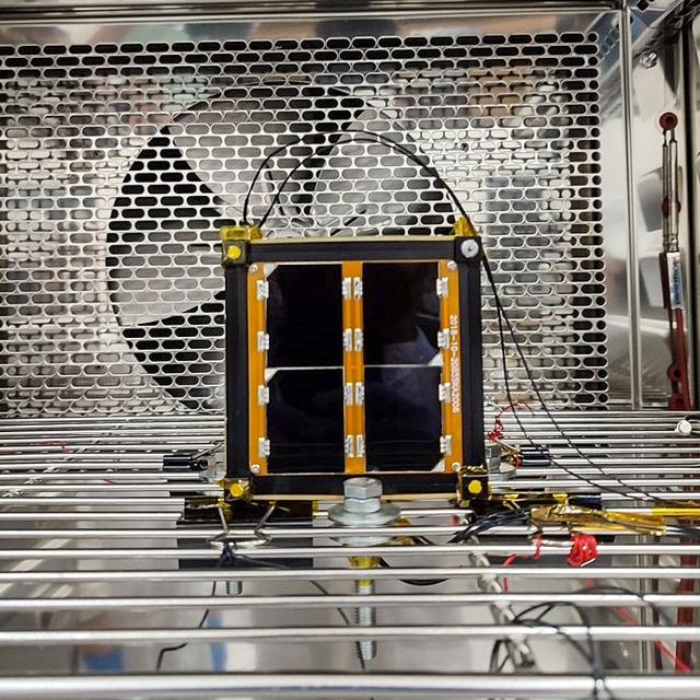 jsc2022e068264 (12/1/2021) --- A preflight view of the Surya Satellite-1 (SS-1) during Thermal Testing. The Surya Satellite-1 (SS-1) is the first Indonesian nanosatellite developed by university students at Surya University. SS-1 tests a satellite telecommunication system to serve amateur radio stations, and serves as a proof of concept of sensoric information transfer in rural areas for disaster mitigation application. Image Courtesy of The SS-1 Team.