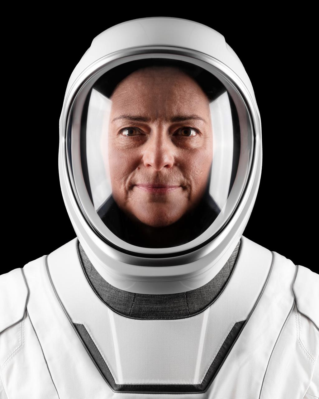jsc2022e068597 (Aug. 19, 2022) --- Astronaut Nicole Aunapu Mann of NASA's Commercial Crew Program, SpaceX Crew-5 Commander, poses for a portrait in her pressure suit at SpaceX headquarters in Hawthorne, California. Credit: SpaceX