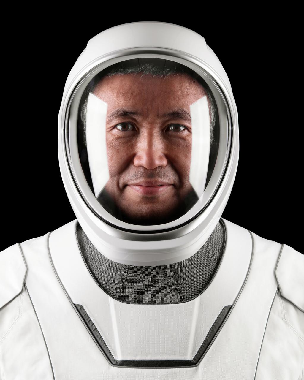jsc2022e068599 (Aug. 19, 2022) --- Astronaut Koichi Wakata of the Japan Aerospace Exploration Agency (JAXA), SpaceX Crew-5 Mission Specialist, poses for a portrait in his pressure suit at SpaceX headquarters in Hawthorne, California. Credit: SpaceX