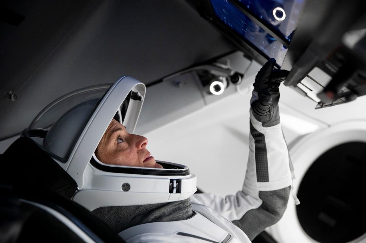 jsc2022e068603 (June 13, 2022) --- SpaceX Crew-5 Commander Nicole Aunapu Mann from NASA is pictured during a Crew Dragon cockpit training session at SpaceX headquarters in Hawthorne, California. Credit: SpaceX
