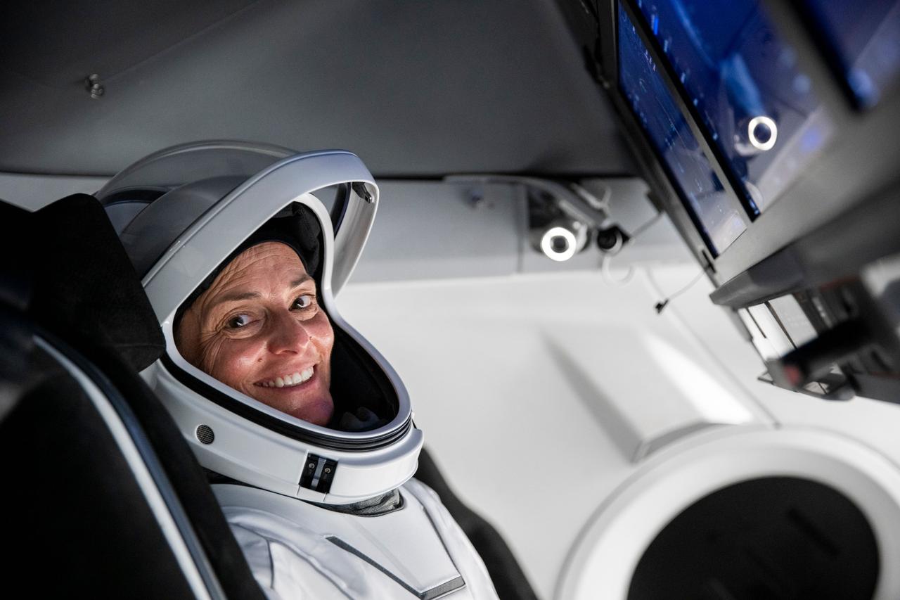 jsc2022e068604 (June 13, 2022) --- SpaceX Crew-5 Commander Nicole Aunapu Mann from NASA is pictured during a Crew Dragon cockpit training session at SpaceX headquarters in Hawthorne, California. Credit: SpaceX