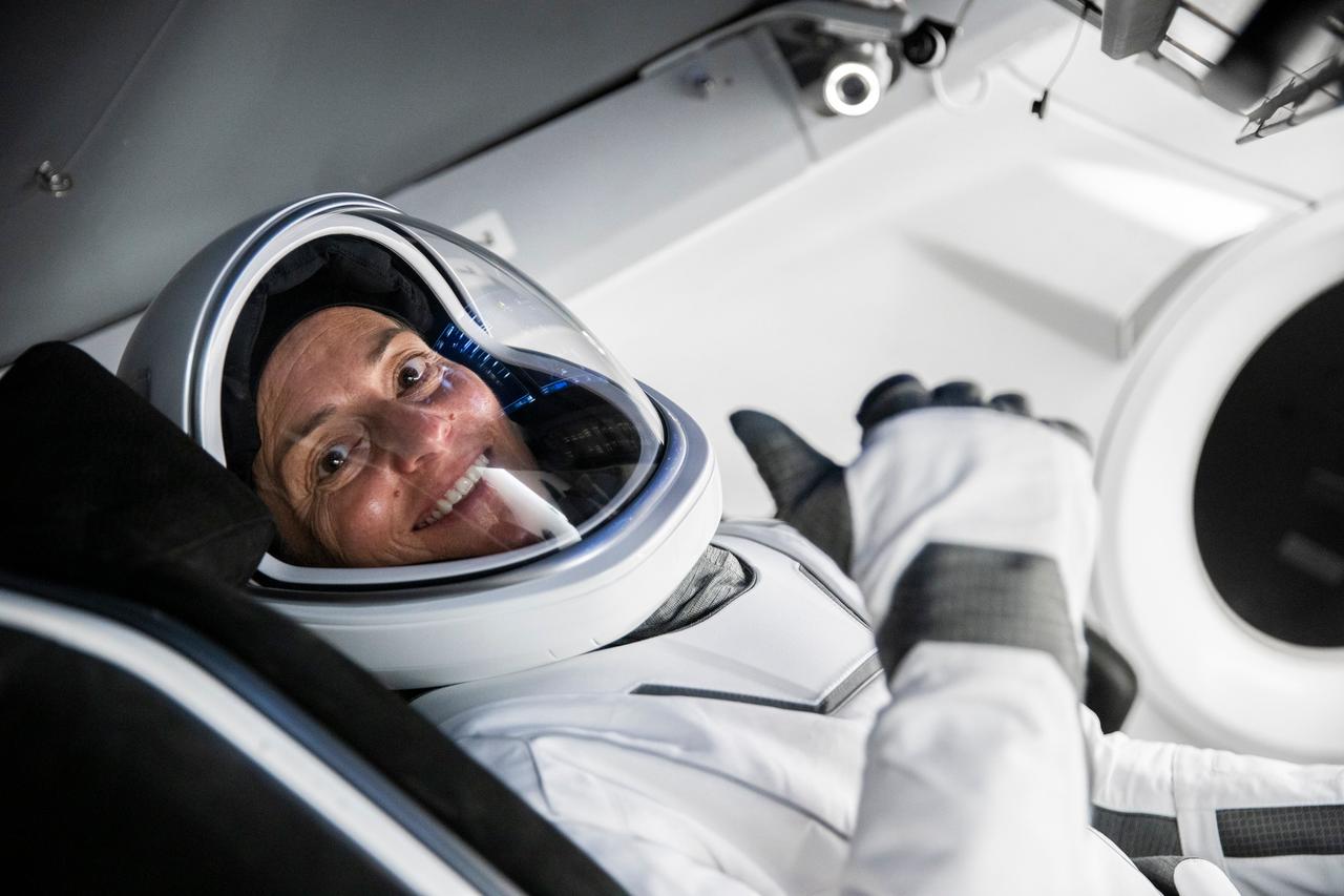 jsc2022e068609 (June 13, 2022) --- SpaceX Crew-5 Commander Nicole Aunapu Mann from NASA is pictured during a Crew Dragon cockpit training session at SpaceX headquarters in Hawthorne, California. Credit: SpaceX