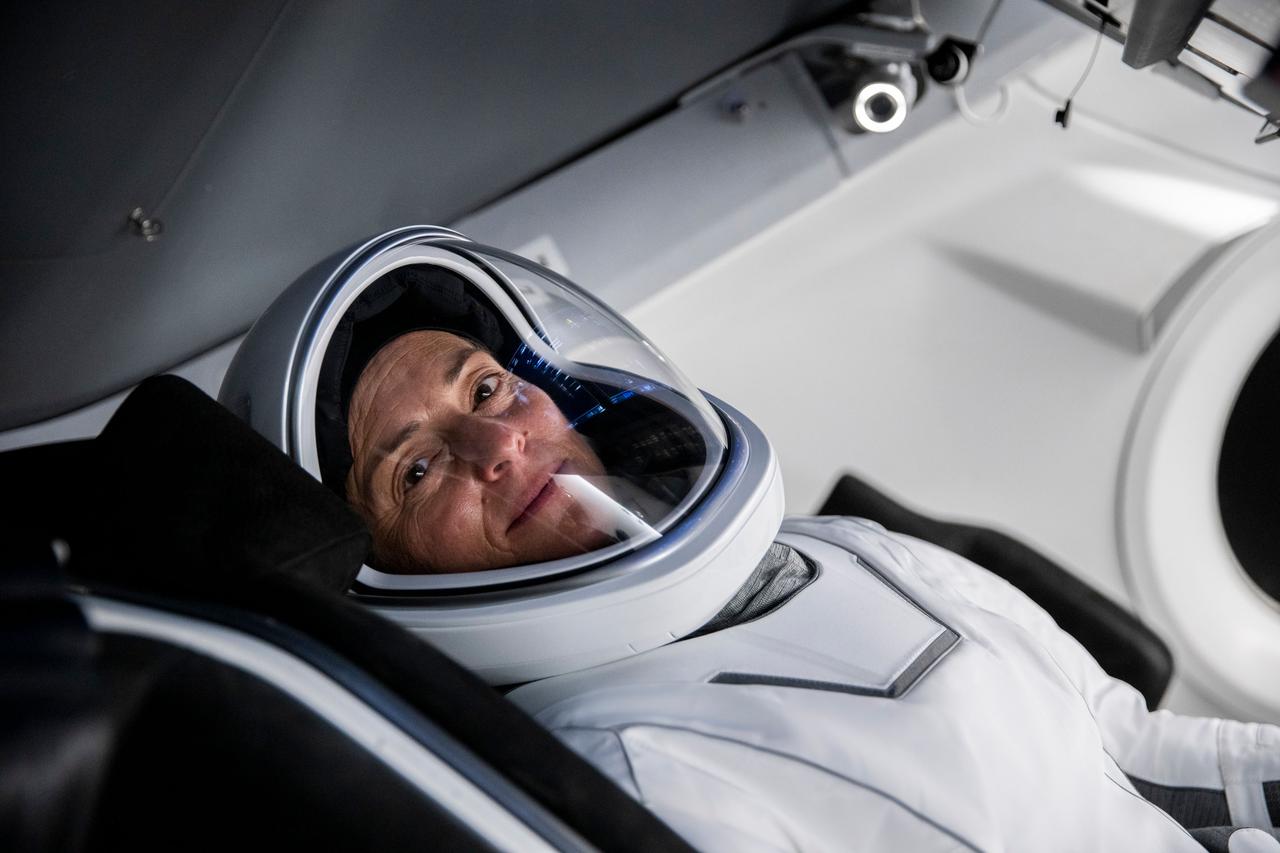 jsc2022e068610 (June 13, 2022) --- SpaceX Crew-5 Commander Nicole Aunapu Mann from NASA is pictured during a Crew Dragon cockpit training session at SpaceX headquarters in Hawthorne, California. Credit: SpaceX