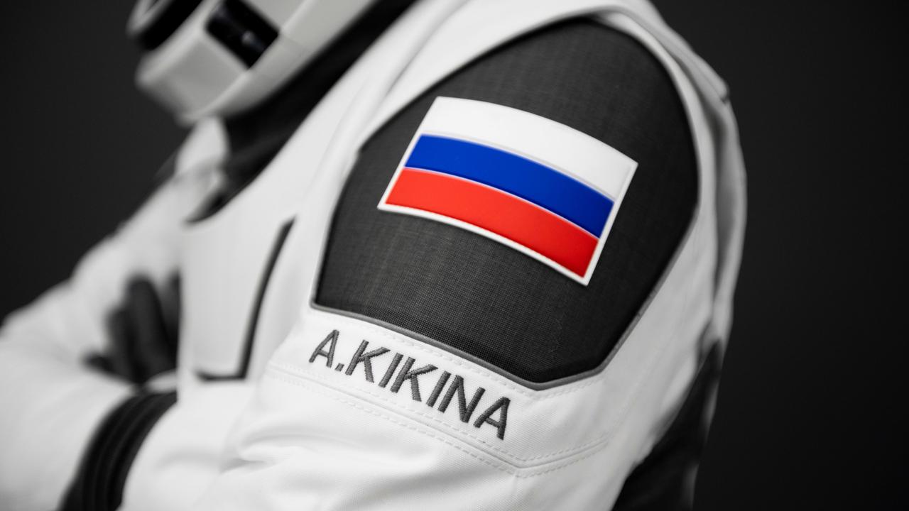 jsc2022e068632 (June 27, 2022) --- A patch representing the country of Russia, with the name of SpaceX Crew-5 Mission Specialist Anna Kikina from Roscosmos beneath, is pictured attached to her Crew Dragon flight suit. Credit: SpaceX