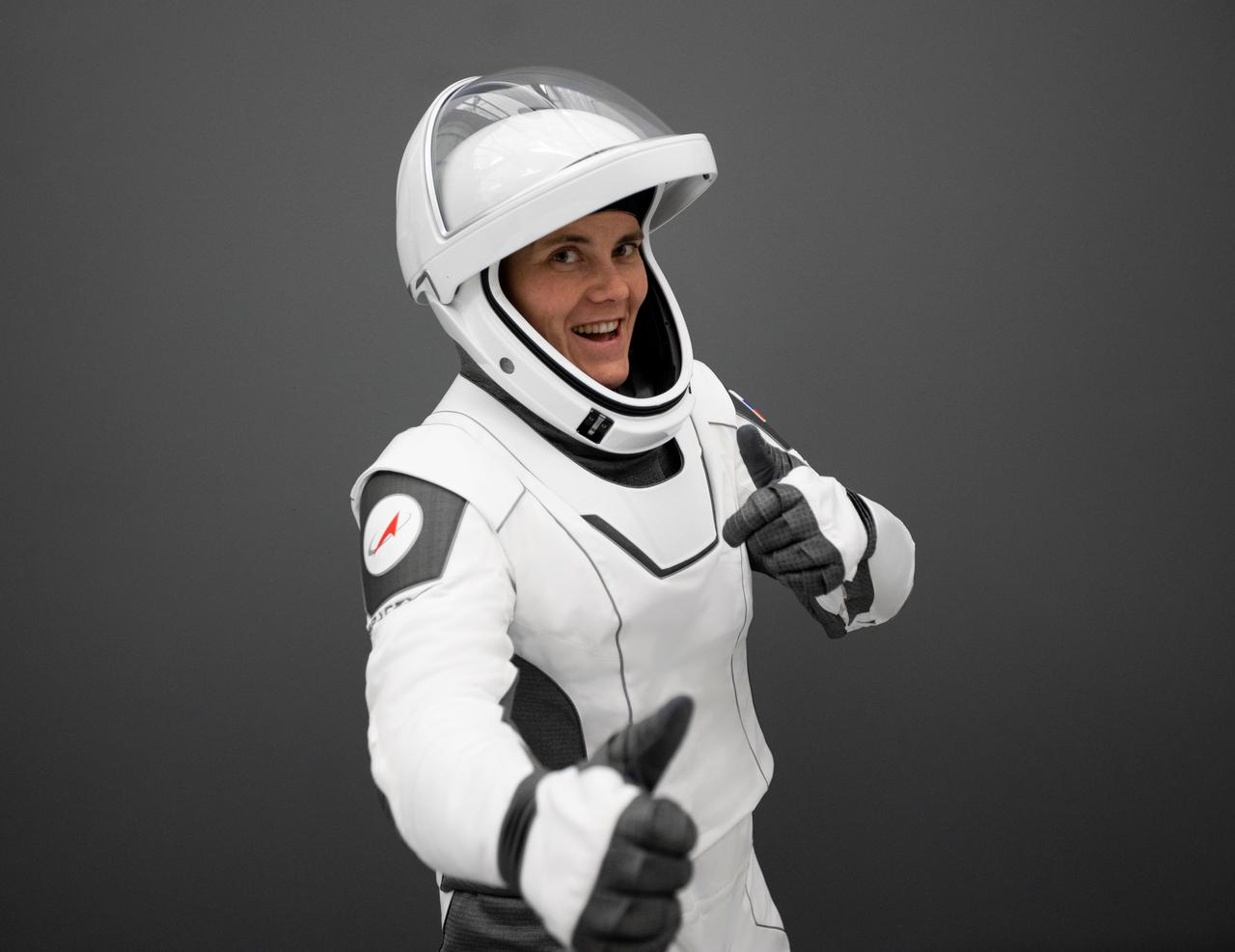 jsc2022e068633 (June 27, 2022) --- SpaceX Crew-5 Mission Specialist Anna Kikina from Roscosmos poses for a portrait in her Crew Dragon flight suit at SpaceX headquarters in Hawthorne, California. Credit: SpaceX