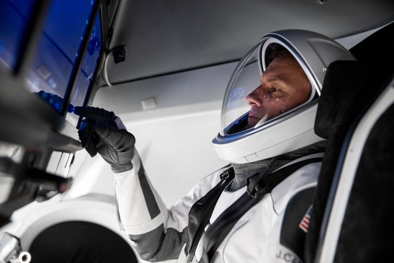 jsc2022e068651 (Aug. 17, 2022) --- SpaceX Crew-5 Pilot Josh Cassada of NASA is pictured during a Crew Dragon cockpit training session at SpaceX headquarters in Hawthorne, California. Credit: SpaceX