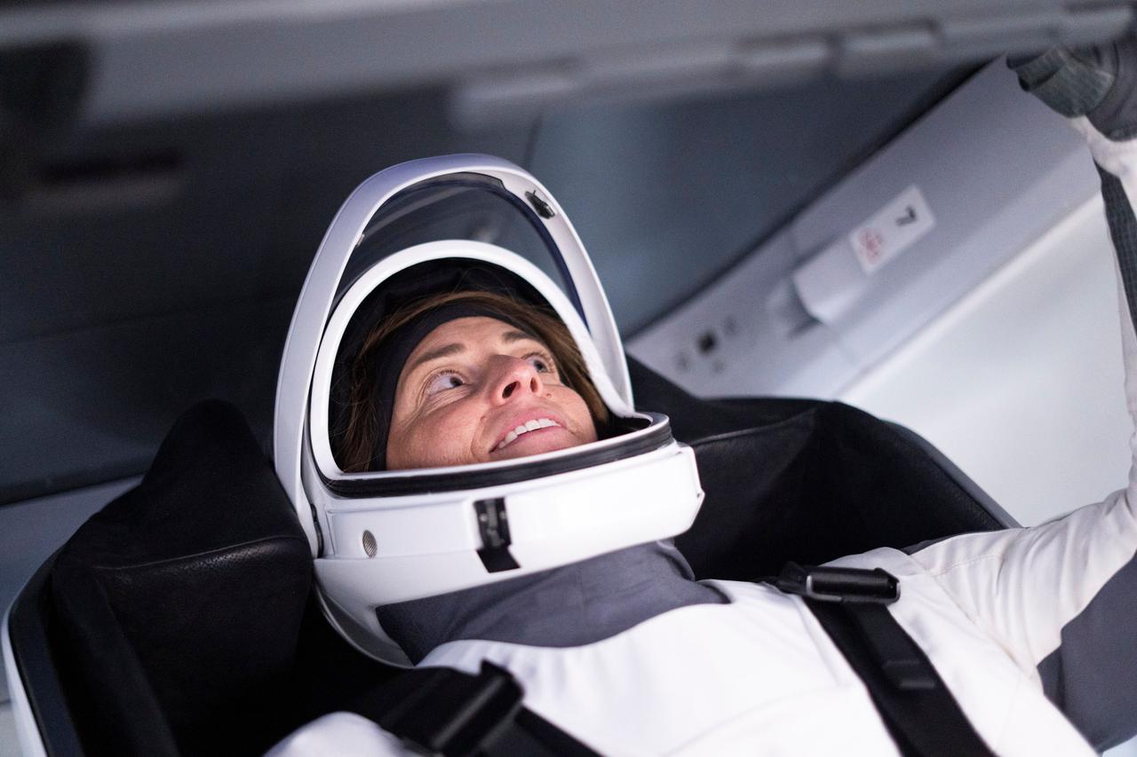 jsc2022e068660 (April 3, 2022) --- SpaceX Crew-5 Commander Nicole Aunapu Mann of NASA is pictured during a Crew Dragon cockpit training session at SpaceX headquarters in Hawthorne, California. Credit: SpaceX