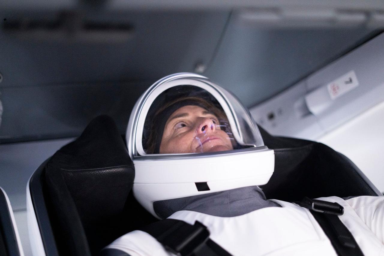 jsc2022e068661 (April 3, 2022) --- SpaceX Crew-5 Commander Nicole Aunapu Mann of NASA is pictured during a Crew Dragon cockpit training session at SpaceX headquarters in Hawthorne, California. Credit: SpaceX