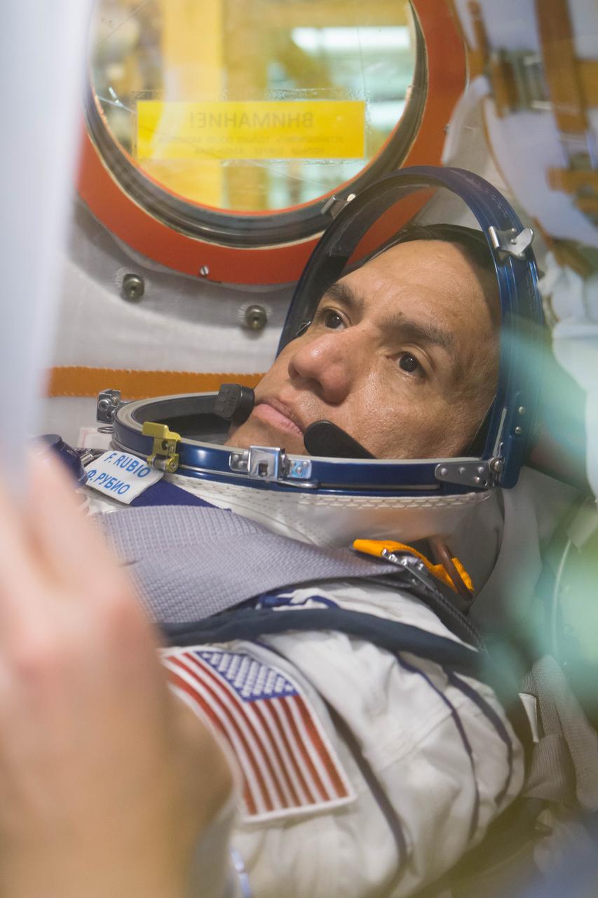 jsc2022e072271 (Sept. 7, 2022) --- At the Baikonur Cosmodrome in Kazakhstan, NASA astronaut Frank Rubio performs preflight checkouts in the Soyuz MS-22 spacecraft. Rubio is scheduled to launch with crewmates Roscosmos cosmonaut Sergey Prokopyev and Dmitri Petelin Sept. 21 for a six-month mission on the International Space Station. Credit: NASA/Victor Zelentsov.