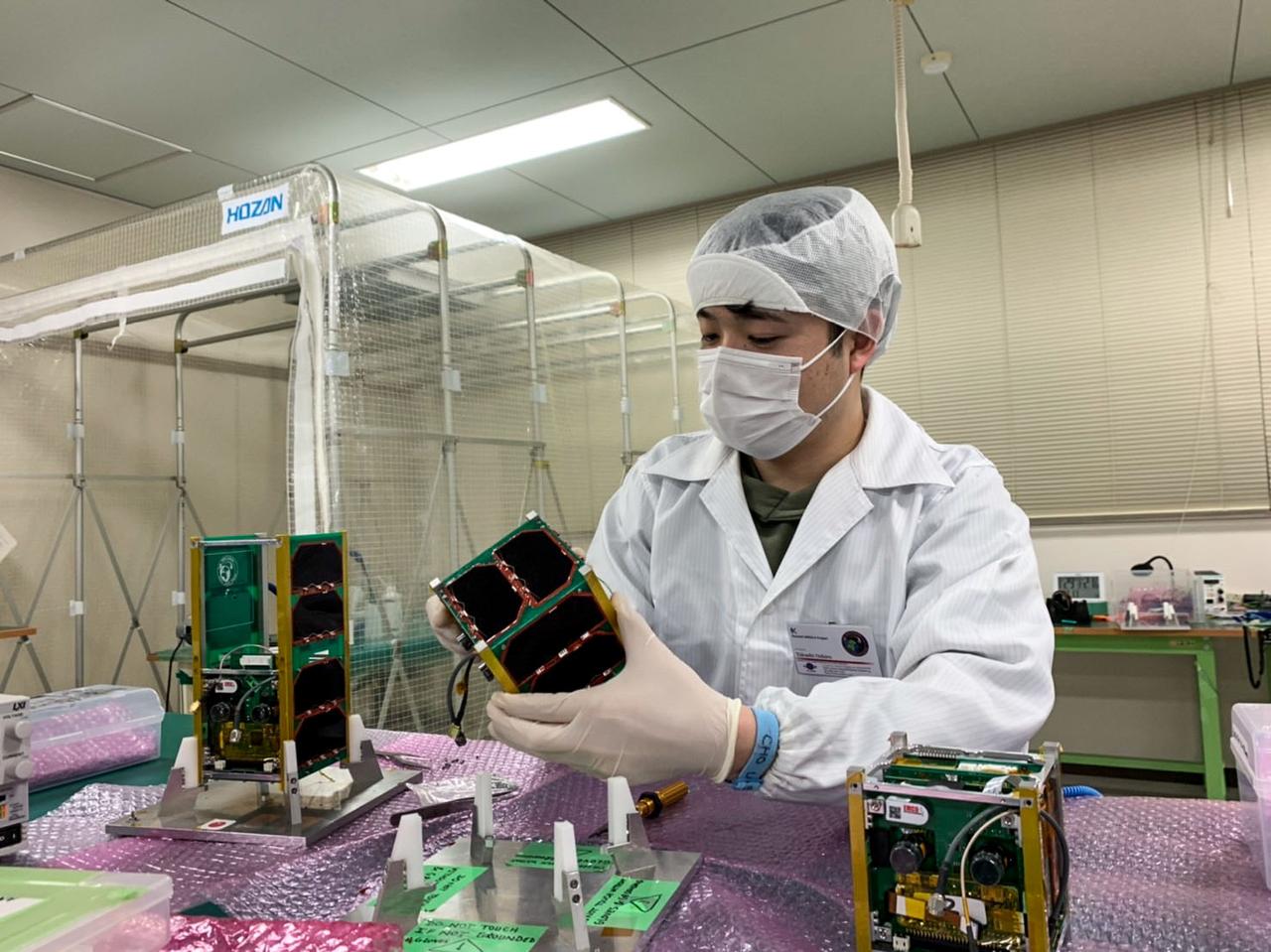 jsc2022e072955 (9/22/2022) --- Flight module assembly is conducted for BIRDS-5 CubeSats. BIRDS-5 is a constellation of two 1U CubeSats and one 2U CubeSat developed by Uganda, Zimbabwe, and Japan that will be deployed from the space station. Image courtesy of BIRDS-5