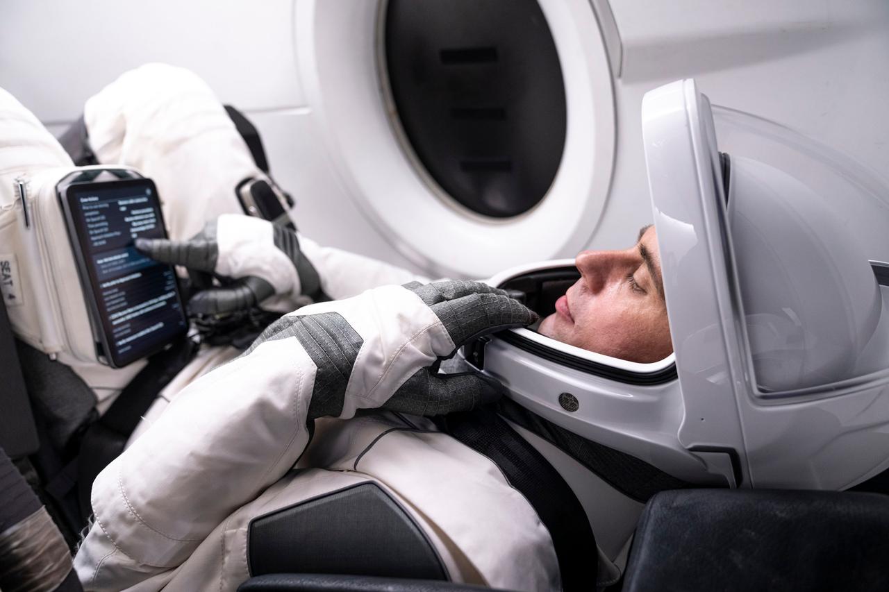 jsc2022e079358 (Sept. 27, 2022) --- SpaceX Crew-6 Mission Specialist Andrey Fedyaev of Roscosmos is pictured training inside a Dragon mockup crew vehicle at the company's headquarters in Hawthorne, California. Credit: SpaceX