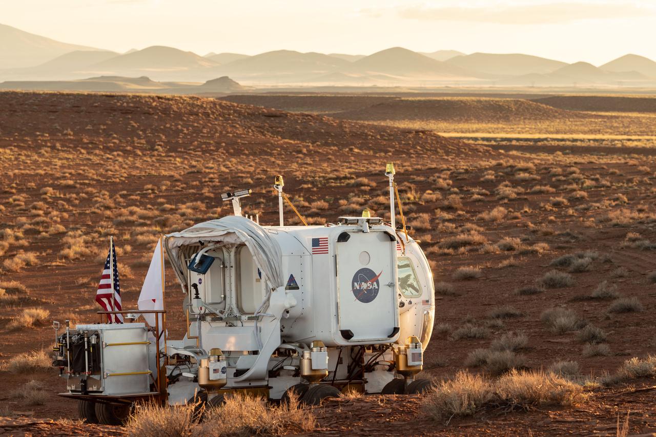 The Desert Research and Technology Studies (DesertRATS) is one of NASA’s analog missions to test hardware and operational scenarios in a remote environment with geographic similarities to the Moon and Mars. In October 2022, NASA evaluated rover design and operations, communications with the Mission Control Center and a Science Evaluation Room at NASA’s Johnson Space Center in Houston. A key element of the DesertRATS analog is the pressurized rover, a capability that is planned for astronaut surface exploration at the Moon and Mars. NASA has a study agreement with the Japan Aerospace Exploration Agency (JAXA) for development of the Artemis pressurized rover, and JAXA representatives  joined NASA at DesertRATS.