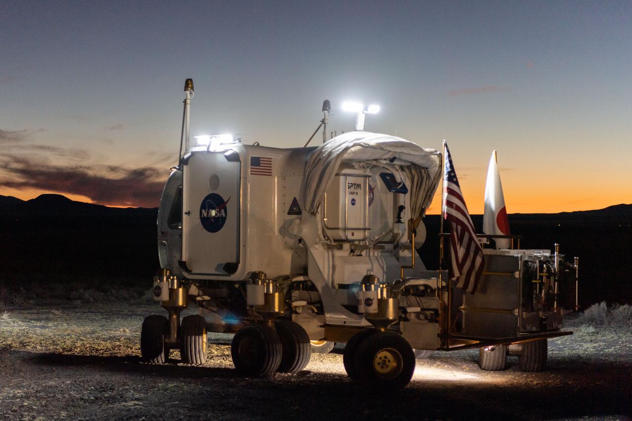 The Desert Research and Technology Studies (DesertRATS) is one of NASA’s analog missions to test hardware and operational scenarios in a remote environment with geographic similarities to the Moon and Mars. In October 2022, NASA evaluated rover design and operations, communications with the Mission Control Center and a Science Evaluation Room at NASA’s Johnson Space Center in Houston. A key element of the DesertRATS analog is the pressurized rover, a capability that is planned for astronaut surface exploration at the Moon and Mars. NASA has a study agreement with the Japan Aerospace Exploration Agency (JAXA) for development of the Artemis pressurized rover, and JAXA representatives  joined NASA at DesertRATS.