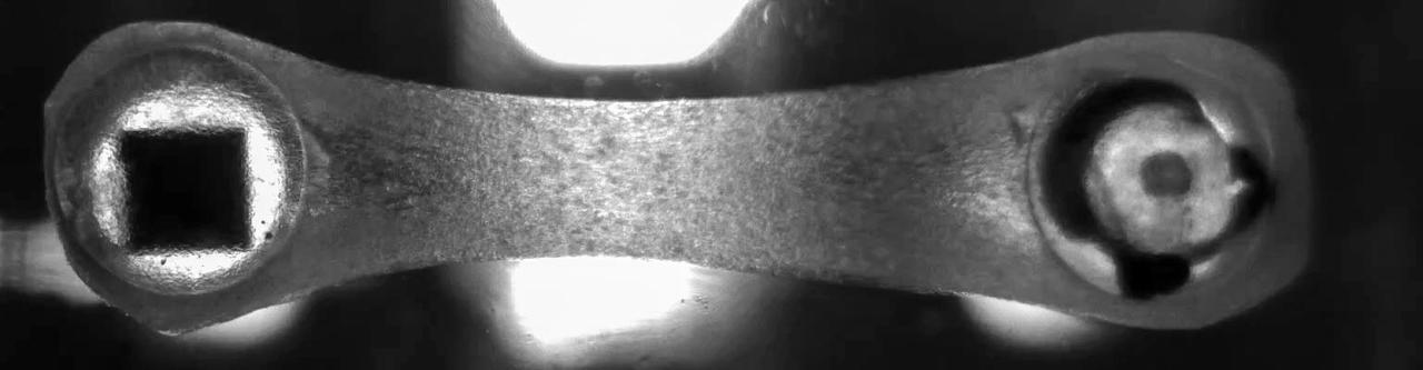 jsc2022e083014 (10/26/2022) --- A preflight image of a beating Engineered Heart Tissue (EHT) for A Human iPSC-based 3D Microphysiological System for Modeling Cardiac Dysfunction in Microgravity (Engineered Heart Tissues-2) investigation. The tissue is fabricated between two posts, one flexible and one rigid. In the flexible post, a square magnet is seen. This magnet enables researchers to measure tissue function using an underlying magnetic sensor, giving real time tissue function data. Image courtesy of Johns Hopkins University.