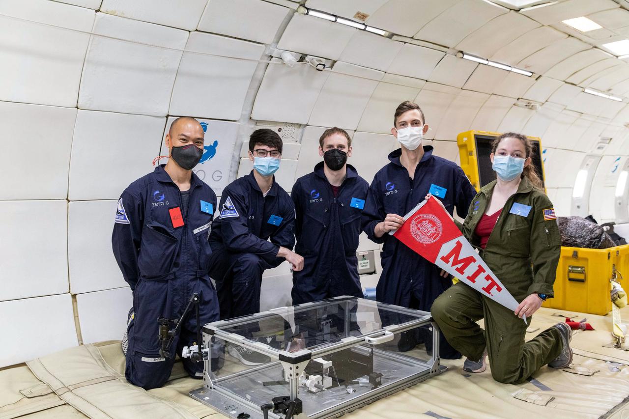 jsc2022e083565 (5/20/2022) --- The MIT Space Exploration Initiative team prior to an Extrusion payload flight test on a parabolic flight in May 2021. Left to Right: Che-Wei Wang, Aiden Padilla, Sean Auffinger, Martin Nisser, and Ariel Ekblaw. Image courtesy of the MIT Space Exploration Initiative.