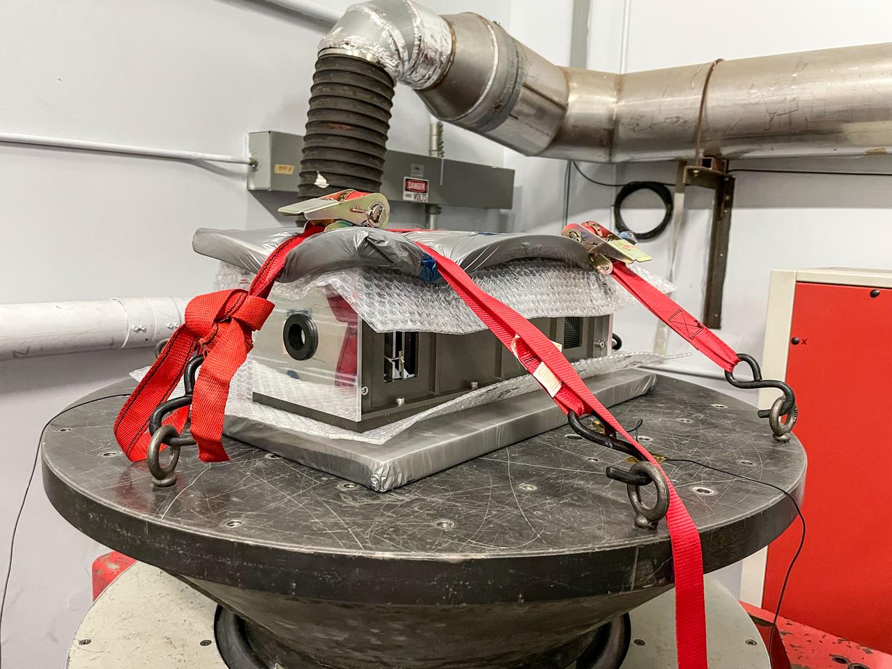 jsc2022e084488 (5/31/2022) --- A prefliight view of the Low Orbit Reconnaissance Imagery Satellite (LORIS) vibration test before integration at the ESL Environmental Technologies lab in Nova Scotia. Image courtesy of GALAXIA Mission Systems, Inc.