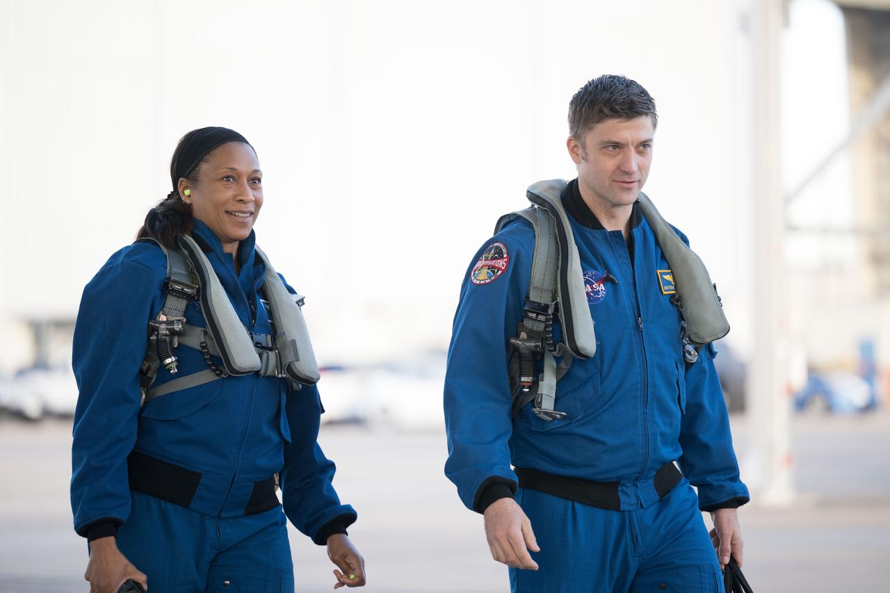 jsc2023e005190 (Jan. 27, 2023) --- NASA astronauts Jeanette Epps and Matthew Dominick, SpaceX Crew-8 Mission Specialist and Commander respectively, walk together before a T-38 trainer jet flight at Ellington Field in Houston, Texas.