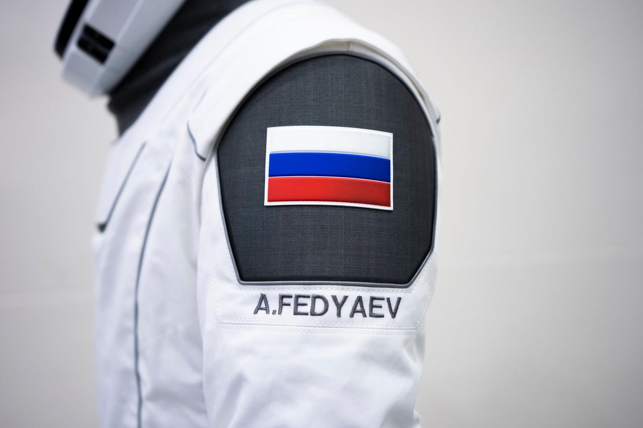 jsc2023e005739 (Jan. 30, 2023) --- A SpaceX launch and entry suit bears a Russian flag, and the name of Roscosmos cosmonaut Andrey Fedyaev, who will serve as a mission specialist of NASA's SpaceX Crew-6 mission to the International Space Station. Credit: SpaceX