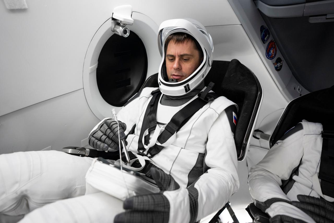 jsc2023e005766 (Jan. 30, 2023) --- Roscosmos cosmonaut and SpaceX Crew-6 Mission Specialist Andrey Fedyaev is pictured during a Crew Dragon cockpit training session at SpaceX headquarters in Hawthorne, California. Credit: SpaceX