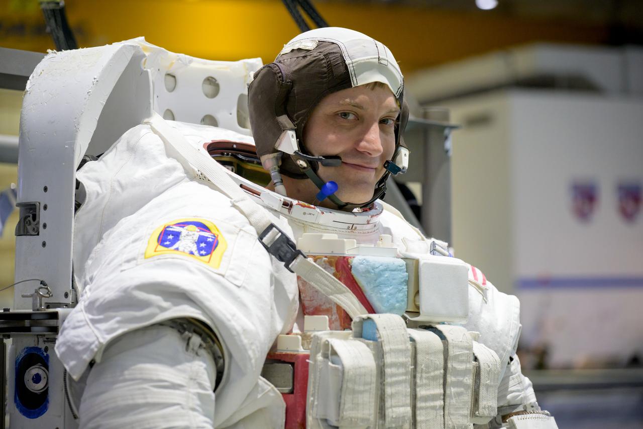 View of SpaceX Crew-8 and NASA astronaut Matthew Dominick in his Extravehicular Mobility Unit (EMU) without his helmet before the ISS Extravehicular Activity (EVA) Maintenance 4 with a suited run at the Neutral Buoyancy Laboratory (NBL).