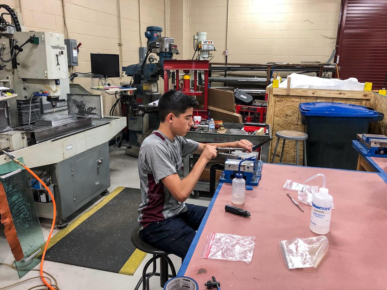 jsc2023e010181 (2/28/2023) --- The High school students United with NASA to Create Hardware (HUNCH) Ball Clamp Monopod (HUNCH Ball Clamp Monopod) investigation aims to test a temporary but stable platform for holding cameras, making camera operations easier and faster for the International Space Station crew. Flight elements were programmed and fabricated by skilled HUNCH machining schools using CNC machinery and HUNCH additive manufacturing schools produced the components for the ball clamp and inserts. Image courtesy of HUNCH.