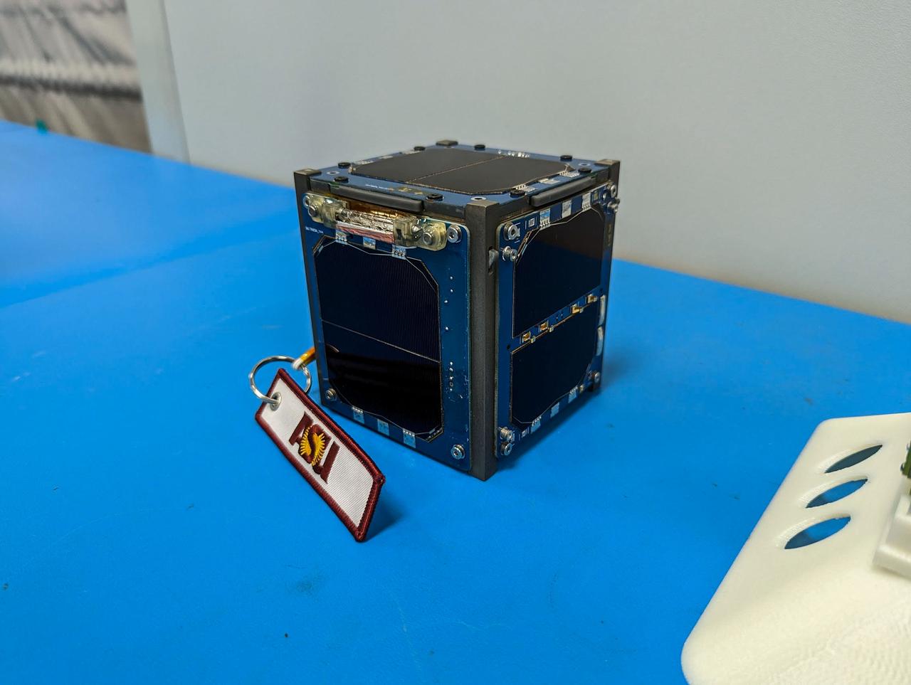 jsc2023e010192 (12/13/2022) --- LightCube CubeSat awaits integration. Image courtesy of Jaime Sanchez de la Vega.