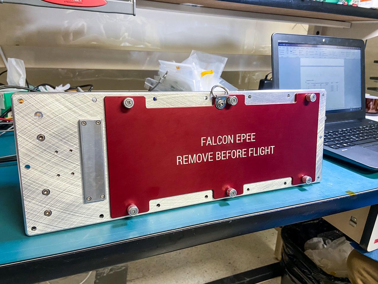 jsc2023e010197 (3/1/2023) --- Space Test Program - Houston 9 - Falcon Electric Propulsion Electrostatic Analyzer Experiment (STP-H9-Falcon-EPEE) with Remove Before Flight Cover upon completion of assembly. Image courtesy of the United States Air Force Academy.